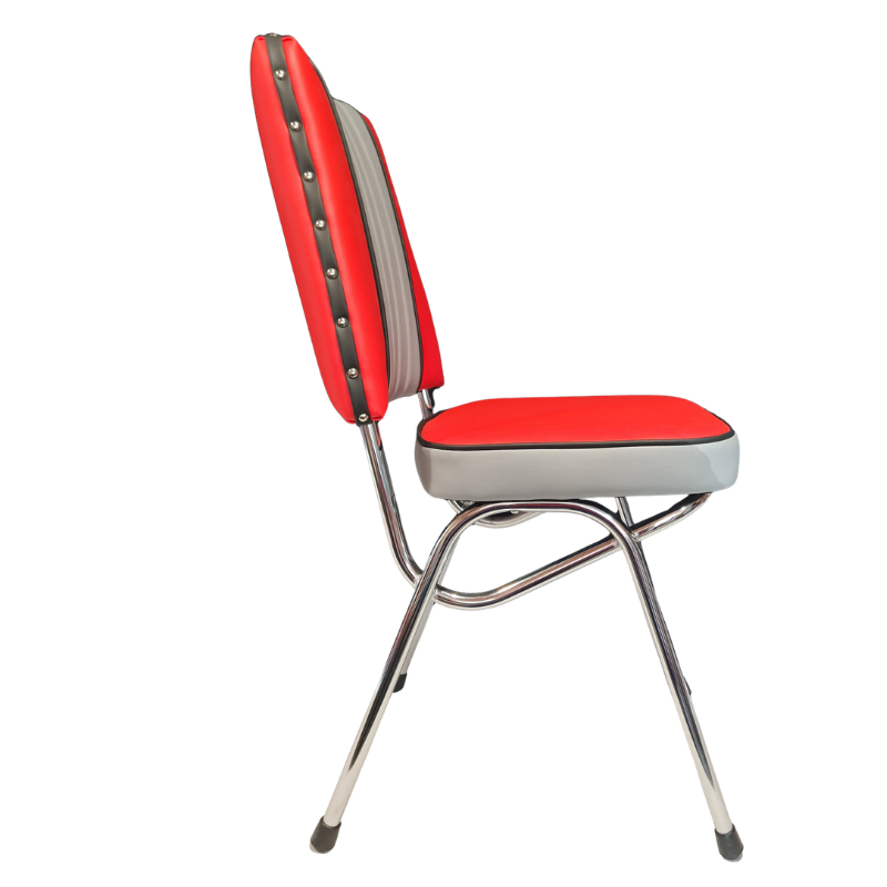 A dining chair with a red vinyl and grey upholstered seat and backrest, grey side panels, and a chrome metal frame with black rubber feet, shown against a plain white background.