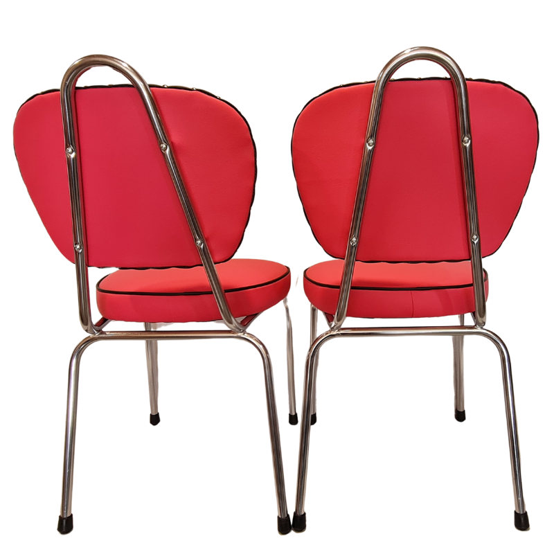 Two hot pink cushioned chairs with chrome frames on a white background