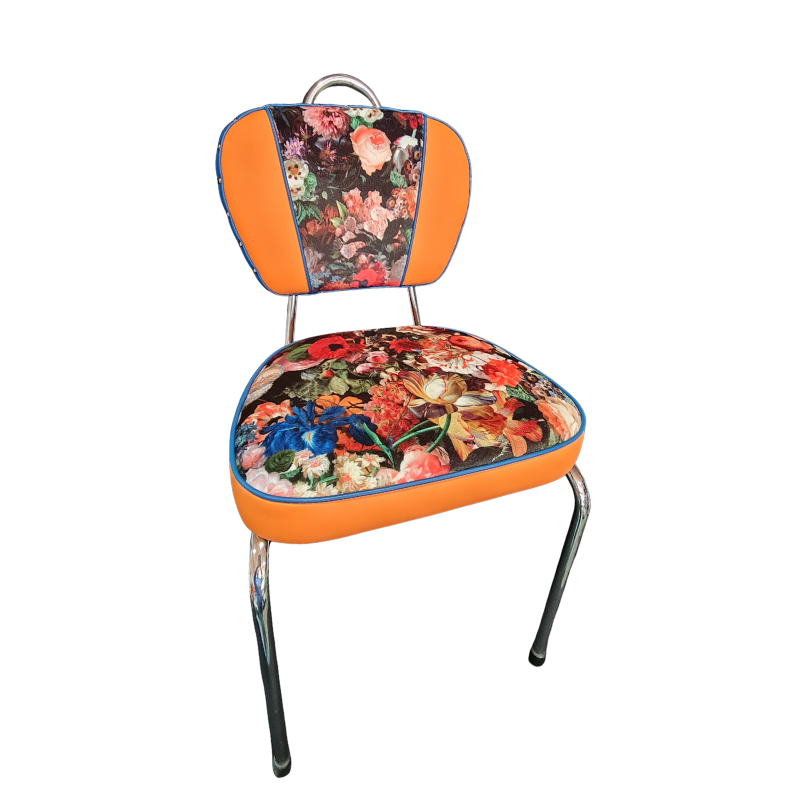 Chair with floral seat and backrest on an orange background