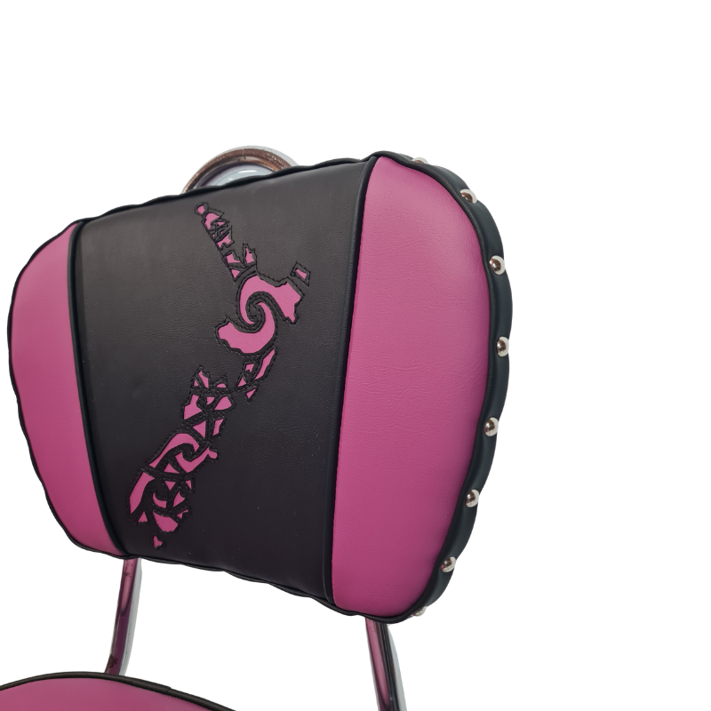 Purple and black chair with decorative pattern on a white background