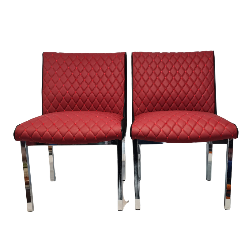 Two burgundy quilted chairs with chrome legs on a white background