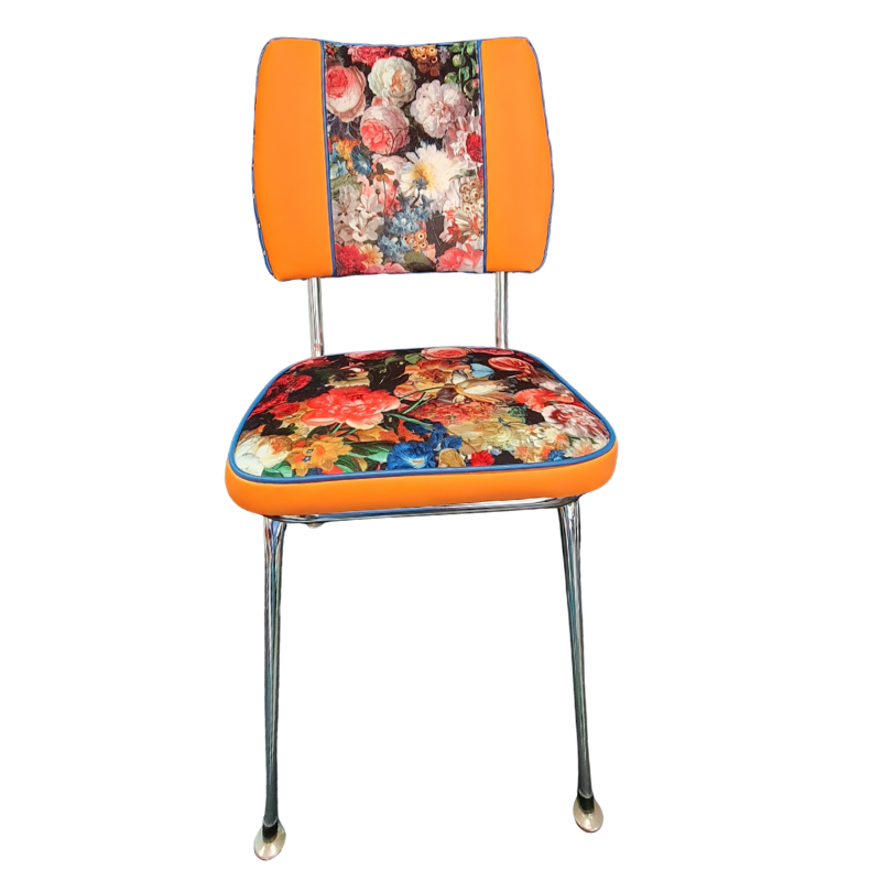 Chair with floral seat and backrest on an orange background